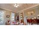 Bright dining room with hardwood floors, large windows, and decorative ceiling at 116 Saint James St., Georgetown, SC 29440