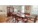 Formal dining room featuring hardwood floors, a large table, and antique china cabinet at 116 Saint James St., Georgetown, SC 29440