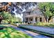 Two-story home with stone exterior, large porch, and lush landscaping at 116 Saint James St., Georgetown, SC 29440