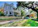 Stone home with a wrap-around porch and beautifully landscaped yard at 116 Saint James St., Georgetown, SC 29440