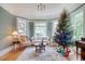 Cozy living room with hardwood floors, a Christmas tree, and comfortable seating at 116 Saint James St., Georgetown, SC 29440