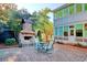 Brick patio with fireplace and seating area, perfect for outdoor entertaining at 116 Saint James St., Georgetown, SC 29440