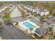 Aerial view of community with pool, pond, and ample parking at 1238 River Oak Dr. # D, Myrtle Beach, SC 29579