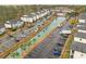Aerial view of community with canal, parking and lush trees at 1238 River Oak Dr. # D, Myrtle Beach, SC 29579