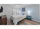 Bedroom with light blue walls and a queen bed at 1238 River Oak Dr. # D, Myrtle Beach, SC 29579
