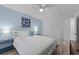 Bedroom with light blue walls and a queen bed at 1238 River Oak Dr. # D, Myrtle Beach, SC 29579