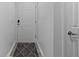 Interior hallway with white walls and wood flooring at 1238 River Oak Dr. # D, Myrtle Beach, SC 29579