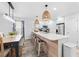 Modern kitchen with light blue cabinets and a large island at 1238 River Oak Dr. # D, Myrtle Beach, SC 29579