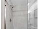 Clean shower with gray tile and glass enclosure at 1238 River Oak Dr. # D, Myrtle Beach, SC 29579