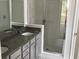 Bathroom with double sinks, granite countertop, and a shower at 196 Machrie Loop # A, Myrtle Beach, SC 29588