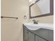 Modern bathroom vanity with dark brown cabinets at 307 20Th Ave. S # 4B, Myrtle Beach, SC 29577