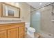Bathroom with granite countertop and walk-in shower at 307 20Th Ave. S # 4B, Myrtle Beach, SC 29577