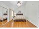 Large bedroom with hardwood floors and mirrored closet at 307 20Th Ave. S # 4B, Myrtle Beach, SC 29577