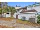 Exterior view of the property, showing the walkway, landscaping and AC unit at 307 20Th Ave. S # 4B, Myrtle Beach, SC 29577