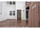 Brown front door with a glass oval window, wooden deck at 307 20Th Ave. S # 4B, Myrtle Beach, SC 29577