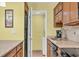 Full kitchen with granite counters and laundry access at 307 20Th Ave. S # 4B, Myrtle Beach, SC 29577
