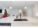 Modern kitchen island with white marble countertop and black sink at 324 Calhoun Falls Dr., Myrtle Beach, SC 29579