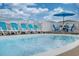 Bright blue pool with lounge chairs at 333 54Th Ave. N, North Myrtle Beach, SC 29582