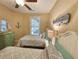 Twin bedroom with coastal decor and built-in shelving at 34 Mingo Dr. # 1D, Pawleys Island, SC 29585