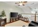 Spacious bonus room with TV, seating area, and loft view at 3940 Loblolly Ave., Little River, SC 29566