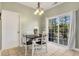 Bright dining area with sliding glass doors to patio at 3940 Loblolly Ave., Little River, SC 29566