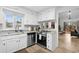 White kitchen with stainless steel appliances and granite countertops at 406 Lafayette Rd., Myrtle Beach, SC 29572