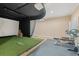 Finished basement with a golf simulator and gym at 4511 Saint Johns Pl., Murrells Inlet, SC 29576