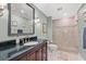 Elegant bathroom with dark vanity and glass shower at 4511 Saint Johns Pl., Murrells Inlet, SC 29576