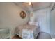 Bright bedroom featuring a comfy bed and beach decor at 4525 S Ocean Blvd. # 306, North Myrtle Beach, SC 29582