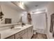 Double vanity bathroom with a large mirror and updated fixtures at 5433 Merrywind Ct., Myrtle Beach, SC 29579