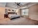 Large bedroom with plush carpeting and a king-size bed at 5433 Merrywind Ct., Myrtle Beach, SC 29579
