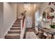 Bright and spacious entryway with stairs, mirror, and console table at 5433 Merrywind Ct., Myrtle Beach, SC 29579