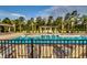 Community pool with a pergola and lounge chairs at 5433 Merrywind Ct., Myrtle Beach, SC 29579