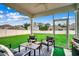Relaxing screened porch overlooking a spacious backyard at 5433 Merrywind Ct., Myrtle Beach, SC 29579