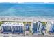 Aerial view of oceanfront building and beach at 5603 Leatherleaf Dr., North Myrtle Beach, SC 29582