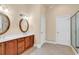 Bathroom with double vanity and large mirrors at 5603 Leatherleaf Dr., North Myrtle Beach, SC 29582