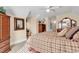 Spacious bedroom with king-size bed and plaid comforter at 5603 Leatherleaf Dr., North Myrtle Beach, SC 29582