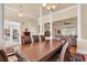 Spacious dining room, hardwood floors, chandelier at 5603 Leatherleaf Dr., North Myrtle Beach, SC 29582