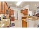 Spacious kitchen with granite countertops and ample wood cabinetry at 5603 Leatherleaf Dr., North Myrtle Beach, SC 29582