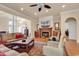 Living room with fireplace, TV, and comfortable seating at 5603 Leatherleaf Dr., North Myrtle Beach, SC 29582