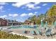 Community pool with lounge chairs and cabanas at 5603 Leatherleaf Dr., North Myrtle Beach, SC 29582