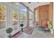 Sunroom with ample natural light and seating area at 5603 Leatherleaf Dr., North Myrtle Beach, SC 29582