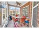 Sunroom with patio furniture and tiled flooring at 5603 Leatherleaf Dr., North Myrtle Beach, SC 29582
