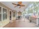 Spacious deck with ceiling fan and outdoor seating at 6001-1604 S Kings Hwy., Myrtle Beach, SC 29575