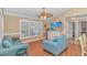 Bright living room with comfy couches and large TV at 6001-1604 S Kings Hwy., Myrtle Beach, SC 29575