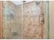 Large walk-in shower with tiled walls at 6001-1604 S Kings Hwy., Myrtle Beach, SC 29575