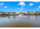 Calm waterway with fountain and waterfront homes at 6001-1604 S Kings Hwy., Myrtle Beach, SC 29575