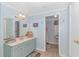Light blue bathroom with vanity, shower, and coastal accents at 6001-Mh81 S Kings Hwy., Myrtle Beach, SC 29575