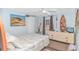 Bedroom with dresser, ceiling fan and coastal decor at 6001-Mh81 S Kings Hwy., Myrtle Beach, SC 29575