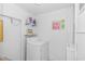 Laundry room with washer, dryer, and beach-themed decor at 6001-Mh81 S Kings Hwy., Myrtle Beach, SC 29575